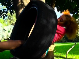 Ebony banged in swinging tyre outdoor